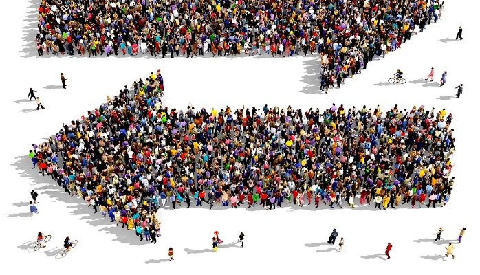 human vectors arranged to form an arrow, referred to as the wisdom of the crowd